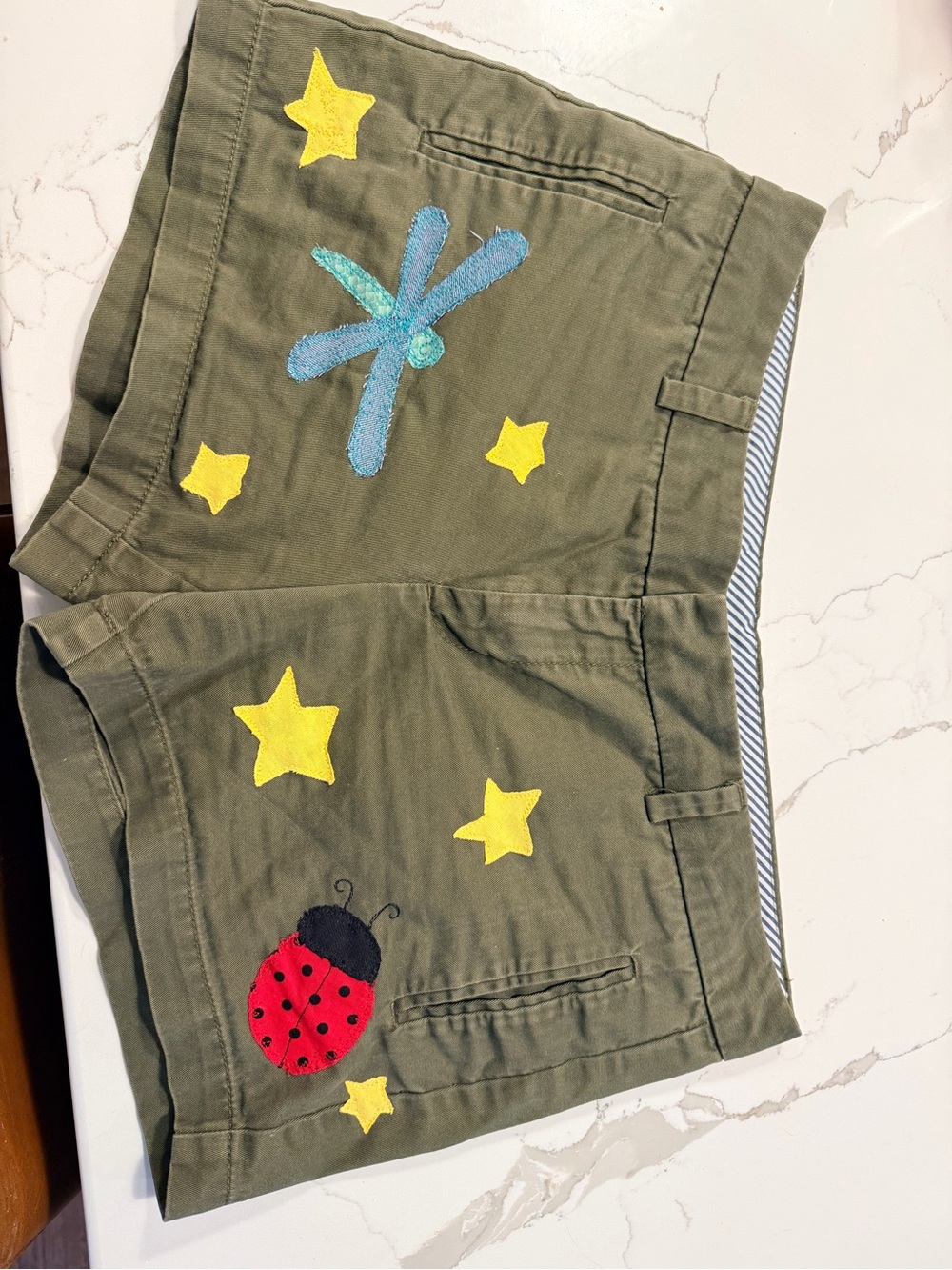 STYLUS Olive Green Shorts with Yellow Stars, Red Ladybug & Teal Dragonfly
